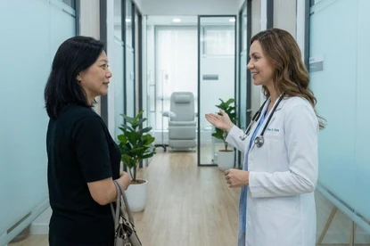 Patient meeting physician at Kuala Lumpur clinic consultation